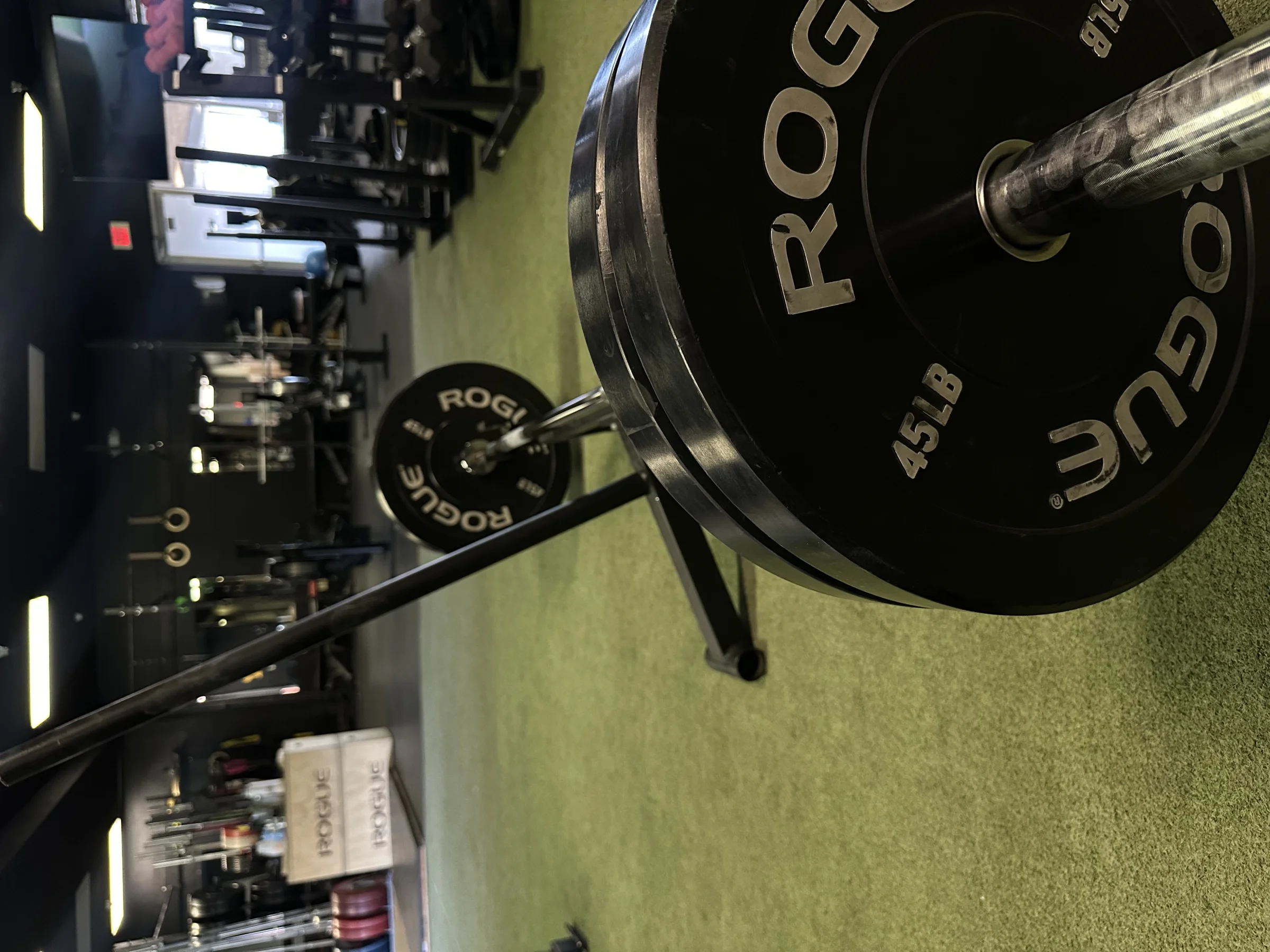 Open gym floor at The Gym of Tucson — quality equipment, serious atmosphere